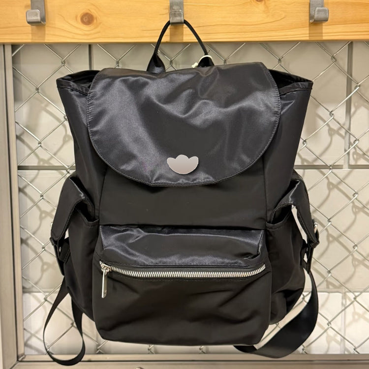 51166089 Black Drawstring Flap Backpack Embroidered Logo Multi Pocket Daily Travel Daypack