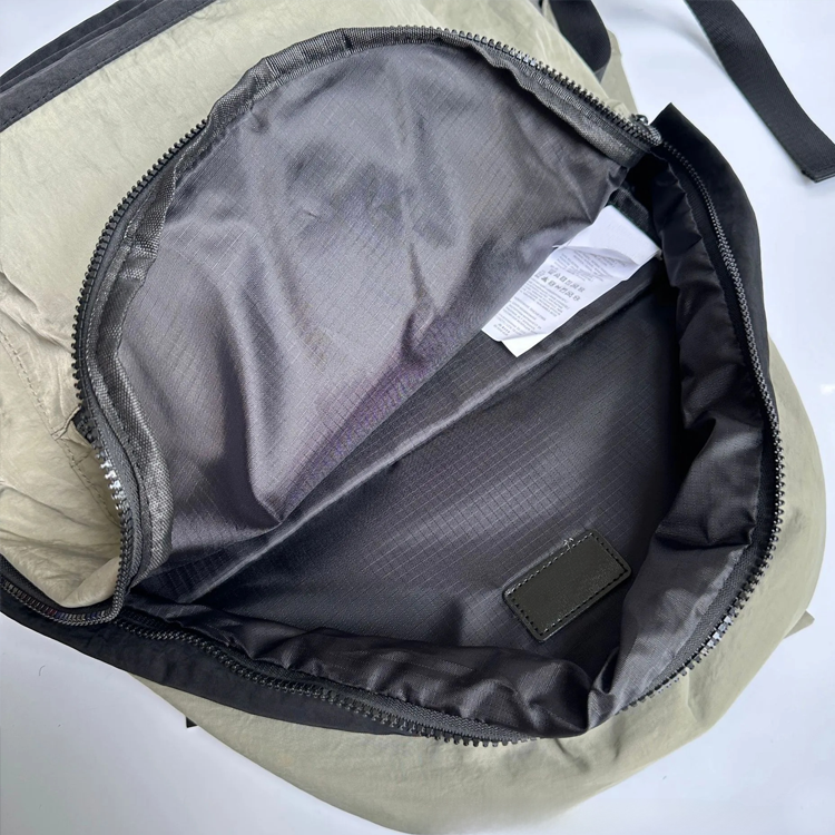 51154808 Small Washed Nylon Backpack Embossed Logo Lightweight Casual School Travel Daypack